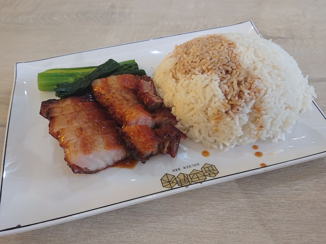 Honey glazed char siu roast pork sliced on a plate