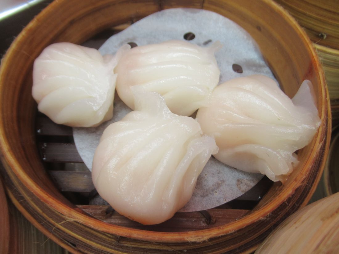 Prawn har gow dumplings in a bamboo steamer