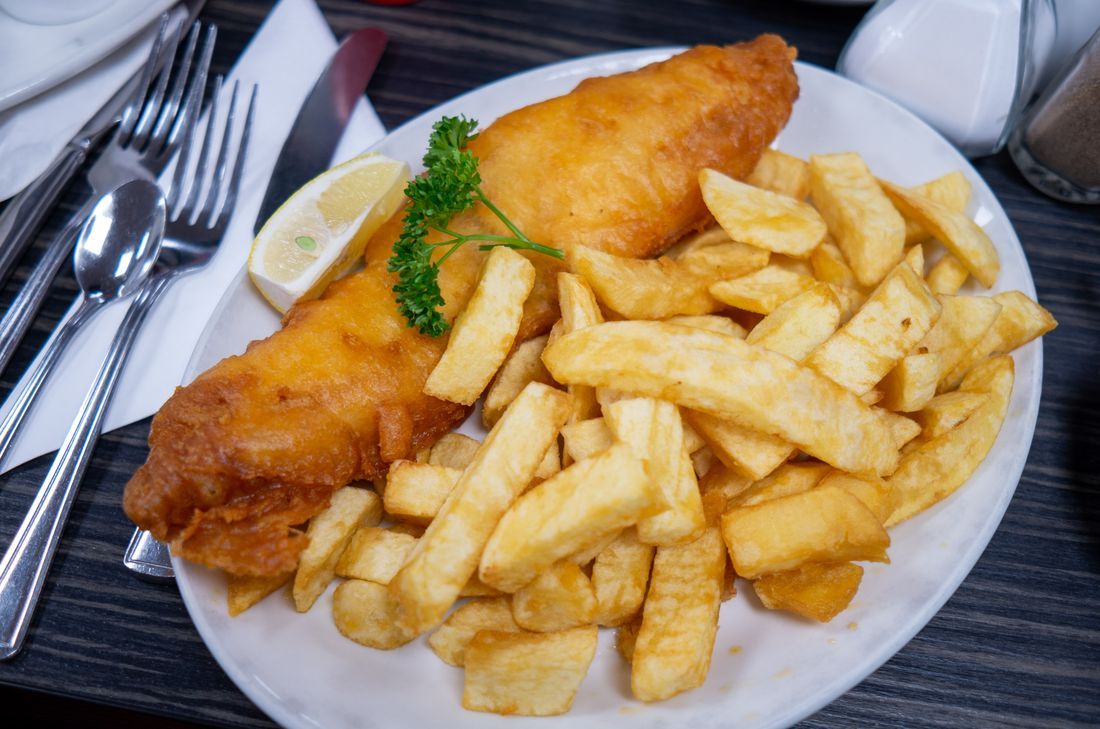Beer-battered fish with thick-cut chips and tartar sauce